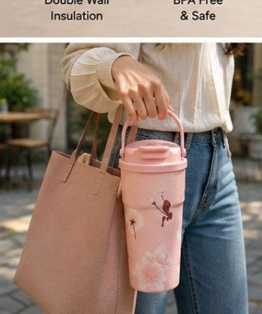 Blush Pink floral thermal tumbler carried outdoors