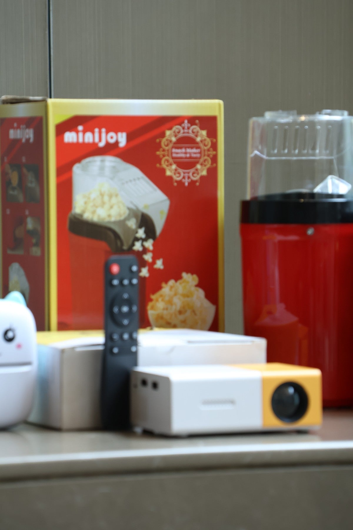 Movie Night Bundle with projector and oil-free popcorn maker from House of Finds product shoot